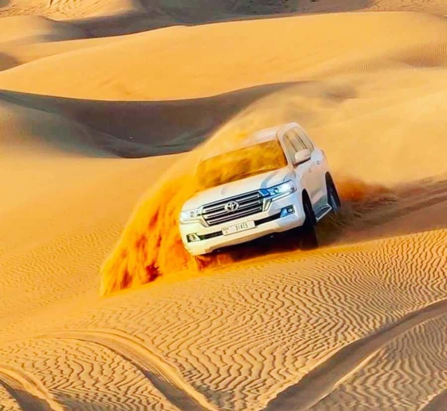 Doha: Sunset Desert Safari with Camel Ride & Sandboarding - Leaving Doha for Qatar’s open desert