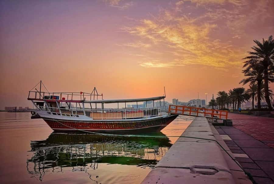 Doha: Sunset Serenade Skyline Dhow Cruise with Buffet Dinner - From the Corniche to the old Dhow Harbor