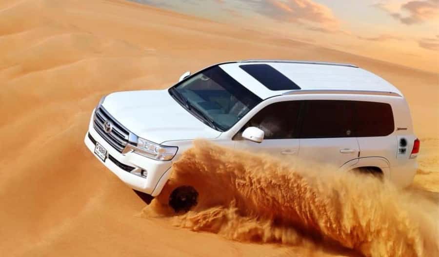 Dune Bashing &Beyond The Ultimate Desert Safari From Doha - Pickup at the National Museum and the ride south
