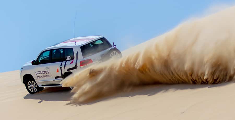 From Doha: 8-hour Safari Tour with Desert Beach Experience - Doha pickup and the hour to the desert