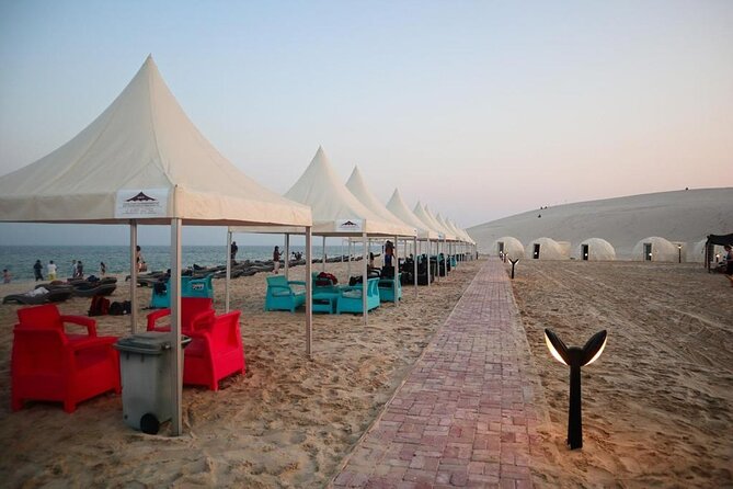 Full Day Desert Safari with Camp Access, Buffet Dinner,Camel Ride - Pickup in Doha and the run south