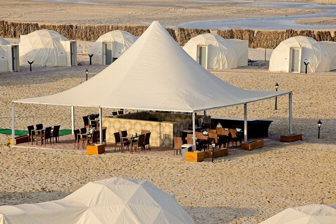 Full-Day DesertSafari with Camel Ride,InlandSea & BBQ Desert Camp - Dune bashing across the sand