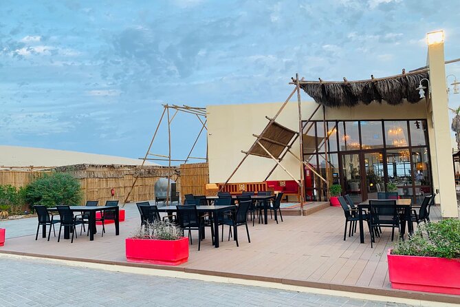 Full-day Qatar desert safari: dune bashing, sandboarding, camels - From Doha to Sealine, where the tires meet the sand