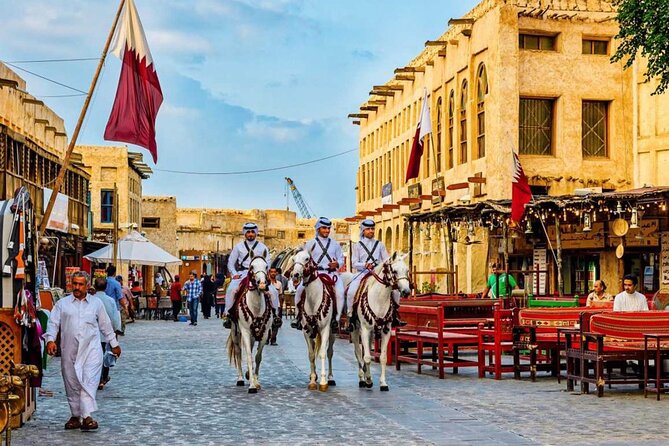 Fullday City Tour and Desert Safari with Camel Ride and SandBoard - Dune bashing and sandboarding at Khor Al Udaid