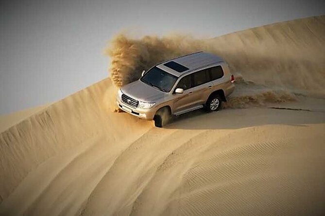 Half Day Desert Safari and Inland Sea - A short camel ride for photographs