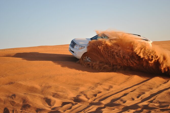 Half Day Desert Safari with Sand Boarding and Camel Ride - Sunset photos and desert views
