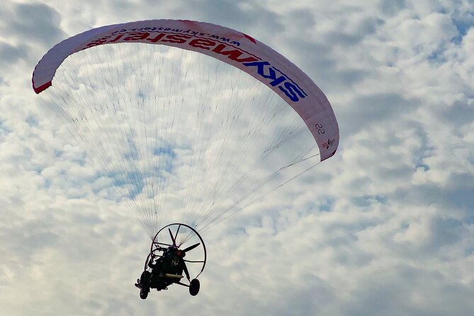 Paratrike Air Tour Doha - Sitting in the Xcitor with your pilot