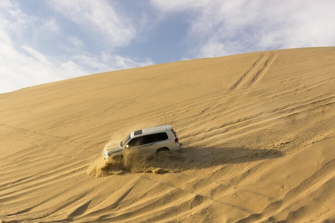 Private Full Day Desert Safari Dinner and Camel Ride in Doha - The camp, Arabic coffee, and dinner in the sand