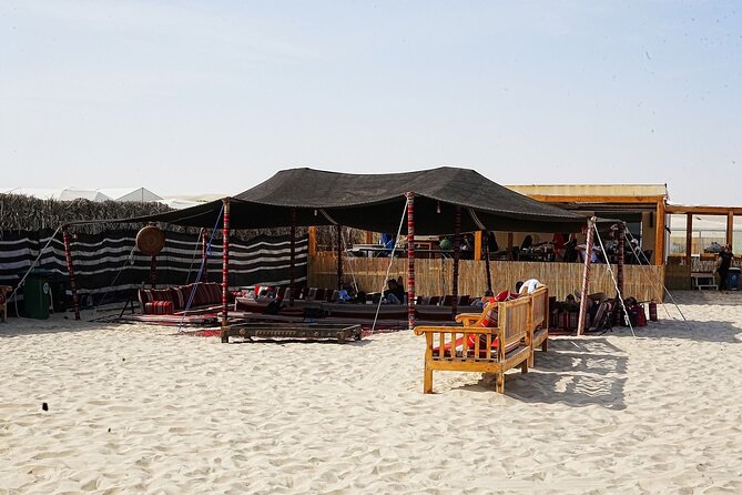Private Full Day Desert Safari Dinner and Camel Ride in Doha - Reaching the Inland Sea
