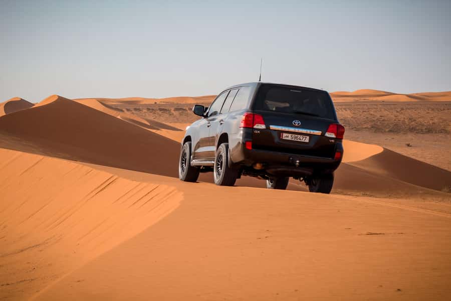 Qatar Desert Safari, Quad bike, Camel Ride and Sandboarding - Four hours from Doha to Qatar’s southern desert