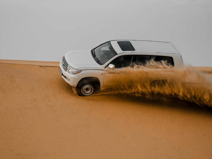 Qatar Desert Safari, Quad bike, Camel Ride and Sandboarding - Dune bashing: Qatar’s main adrenaline stop