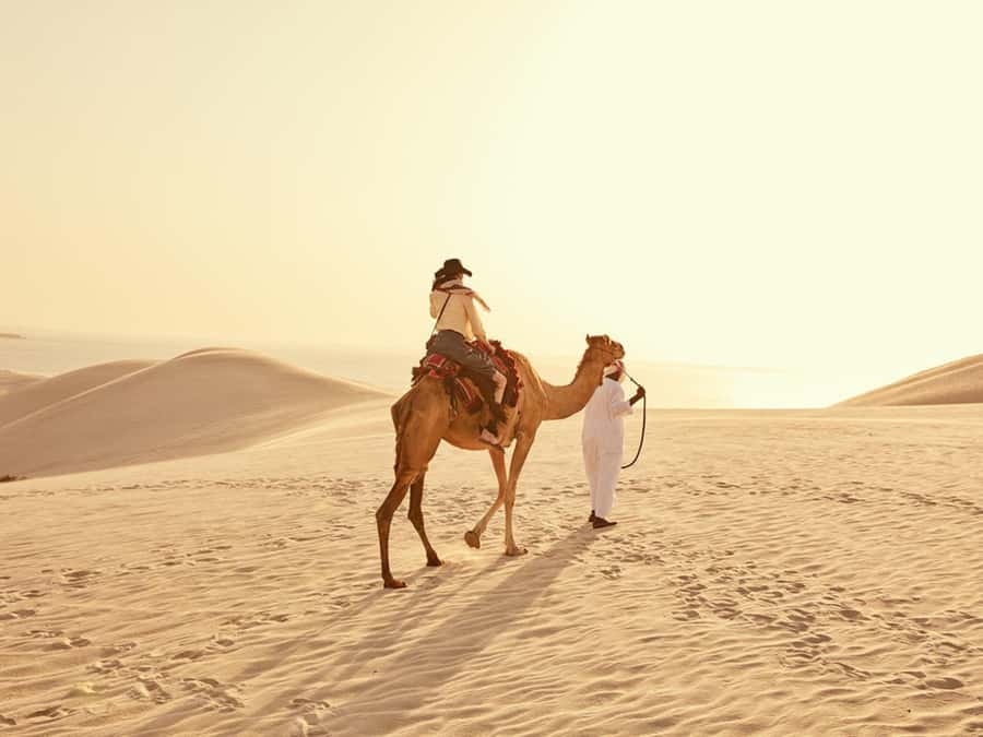 Qatar Desert Safari, Quad bike, Camel Ride and Sandboarding - The Inland Sea stop for photos and sandboarding