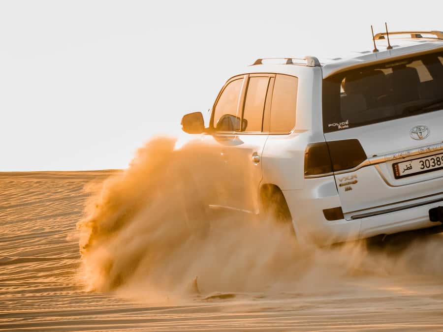 Qatar Desert Safari, Quad bike, Camel Ride and Sandboarding - The drive to Mesaieed and the first desert stop