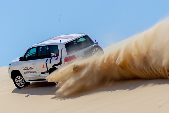 Qatar Half Day Desert Safari(Camel Rides & Sandboarding) - Camel riding and sandboarding in one visit