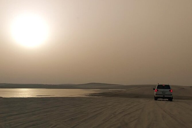 Qatar Sunset Desert Safari: Dune Bashing & Golden Sands Adventure - Leaving Doha for Qatar’s golden dunes