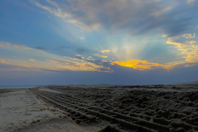 Special Private Arabic Setup with Desert safari experience. - An Arabian meal above the dunes