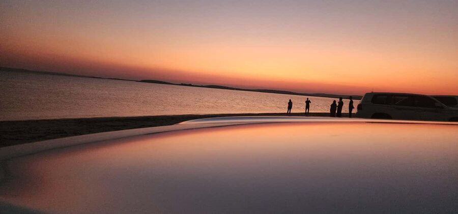 Sunrise or Sunset desert Safari with Sandboarding in Qatar - Dune bashing with a steady hand at the wheel