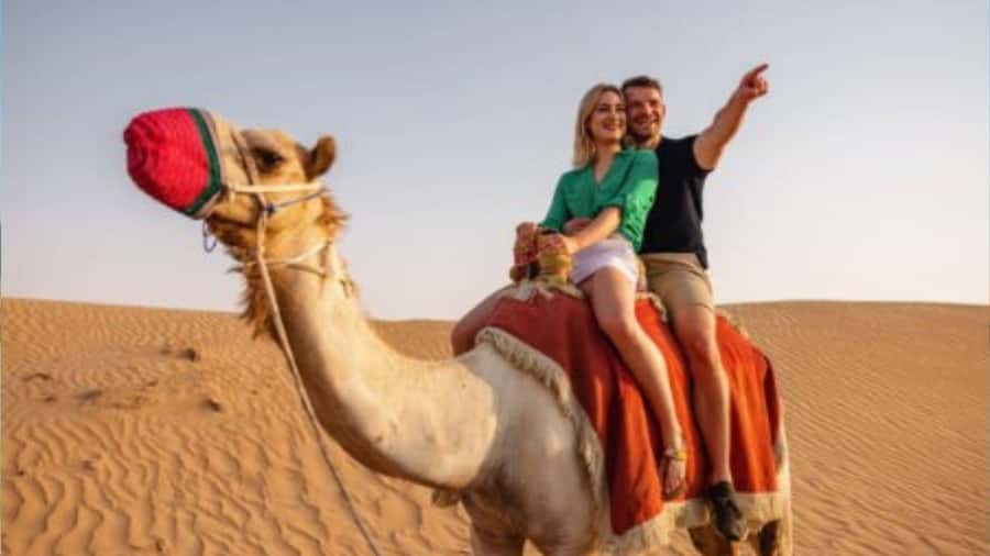 Sunrise/Sunset DuneBashing,CamelRide InlandSea &Sandboarding - A short camel ride with a traditional feel